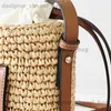 Shoulder Bags Grass woven bag high-quality spring/summer fashionable womens bag Lafite grass trend woven bucket vegetable basket bag handheld T240416