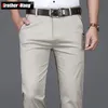 Klassisk stil sommarmens tunna bomull casual byxor affärsmode stretch lös rak beige byxor manliga märke kläder 240415