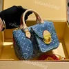 Denim Designer vintage Bolsa de ombro para mulheres bolsas de bolsa Bolsa Bolsa Carregar All Flower Flower Undermail Print Backpack Backpack Gold Hardware Bolsa Blue Boly Bolsa