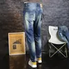 Męskie dżinsy włoskie projektant mody Wysoka jakość retro blueelastic Slim Fit Split Casual