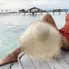 Chaps à bord large Ins Paille faite à la main Femmes Sun Femmes de haute qualité Natural Raffia Panama Caps Girls Floppy Holiday Beach