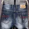 Mens Graffiti Ripped Short Jeans 2024 Summer Fashion Casual Slim Big Hole Retro Style Denim Shorts Mane Brand Clothes 240409