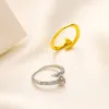 Anneaux de bande de marque pour hommes du créateur de mode pour femmes Anneau 18k Gold plaqué Crystal Metal Daisy Ring Jewelry Femme Open Ajustement