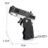 Gun Toys 1pcs Keychain Gun 60 Rubberen bands Rubberen band Gun schietpistool Legering Kid Outdoor Party Metal Gun Gift vriendje Gift grappig 240416