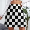 Юбки Клетчатая черно -белая мини -юбка на внешней одежде 90 -х