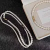 Shi Jiaao White Magnetic Buckle Round Pearl Necklace for Women 2024 New Layered Sweater Chain Light Luxury Style Neck Chain
