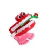 Uhrwerk Spielzeug obere Kette springende Zahn Kinder Springen Zähne laufen Frühling zum Halloween Weihnachtsgeschenk 240408