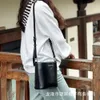 Bolsas noturnas Primavera/verão Novo produto Genuine Leather Chide Triângulo Invertido Casa Casa Sólida Versátil Saco de Balde