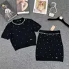 Miumiuss Suit Designer Luxury Fashion Two Piece Spring New Round Neck Short Sleeved Knitted Shirt For Hip Half Skirt Set For Women