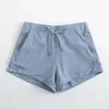 Contrôle Shorts Lu Align Tummy Yoga Capris pour les femmes avec des poches de téléphone Entraînement en cours d'exécution à 4 voies Shorts de tissu