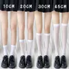 Chaussettes sexy jk femme bassages mignons noirs blancs lolita longues chaussettes solides couleurs genoues hautes filles kawaii cosplay chaussettes en nylon sexy 240416