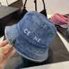 Nouveau denim Bucket Hat Designers Chapeaux Hommes Femmes Luxury Sunshade Classic Elegant Charm Fashion Trend Casual Sunlight Gift Summer Summer Sun Protection