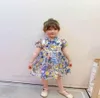 Designer bambini abiti stampati vintage ragazze orso lettera laceup manica soffice abito principessa abito per bambini di lusso abbigliamento da festa a7017628258