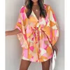 Lässige Kleider Frauen Sommer fliegende Ärmel V-Ausschnitt Schnürung Druck Strandkleid 2024 Ladies Viertel Ärmel loser Knopf Mini Vestidos