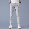 Calça masculina casual perna larga gelo gelo seda versão coreana da moda e versátil respirável