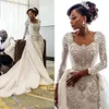 African Long Sleeves Lace Mermaid Wedding Dresses Scoop Neck Lace Applique Beaded Crystals Over Skirts Court Train Wedding Bridal Gown