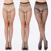 Chaussettes sexy femmes sexy floral fishnet collants transparents minces minces minces de fête de fête trous nets trous noirs collants en livraison gratuite 240416