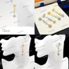 M01262 G Boucles d'oreilles RAM Classic Alphabet Zircon Fleur de luxe Haute Bangle V Boucles d'oreilles Chandelier 18K Gol