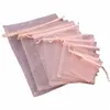 100pcs Sacs d'organza Sacs-cadeaux en organza transparent avec des bijoux de cordon favori