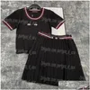 Tvådelt klänning stickade kvinnor hoppare toppar kjolar set lyxdesigner bokstäver kontrast färg tees veckade kjol outfit elegant casual otx4t