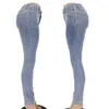 Kvinnors jeans 2024 Autumn and Winter Network Red High midja tätt inslagna höft denim byxor kvinna låg stigning