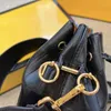 Sacchetti di secchio Donne borsetta borse a portata di mano borse borse tela sapa in pelle classica hardware oro oro borse a mano trasversale