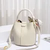 Zi mu cai lan dames tas handheld nieuw lychee patroon een schouderforens crossbody wateremmer