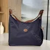 Toptan hobo kapalı ucuz banliyö 2024 mağaza çantası çantası% 90 feis eğlence crossbody el çantası moda askı naylon omuz tarzı büyük kapasite totewallte qphq