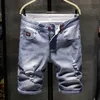 Heren denim chino mode shorts gewassen denim boys skinny catwalk korte heren jeans shorts homme vernietigde gescheurde jeans plus maat 240410