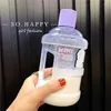 Les bouteilles d'eau portent un mini seau de bouteille créative mignon sport portable avec paille de paille à vélo de voyage en plastique Juice Drink Ware