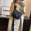 Małe okrągłe damskie crossbody 2024 Spring/Summer New Oxford Tkanina prosta i wszechstronna klatka piersiowa swobodna mini torba na ramię 75% fabrycznie hurtowa