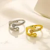 Anneaux de bande de marque pour hommes du créateur de mode pour femmes Anneau 18k Gold plaqué Crystal Metal Daisy Ring Jewelry Femme Open Ajustement