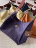 Designer Off Handbag Sac Clearance Sacs de vente au détail Femmes en gros Tote 95% Tote 2024 Le banlieuson peut être le même à forte capacité de nylon à grand style Faye One épaule Postman Wuja