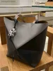 Lyxig högkvalitativ loeweelry designerväskor för kvinnor violet väska pussel vikta fällbara geometri väska handhållen axel crossbody väska med original 1to1 märke logotyp