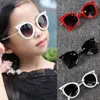 Lunettes de soleil 1pc Kids Eye élégant Eye vintage Girls Vintage mignons Sun Gernes Party UV400 PEUSEURES Nuances Belles enfants Élèves pour cadeau