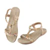 Sandaler Summer Women's Shoes Bekväm mjuk Sole Fashion Bohemian Beach Hollow Flat Zapatos Mujer 2024 Tendencia