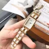 Montre-bracelets de mode simple rectangle petit cadran première quartz watch gold metal et cuir wristwatch dames bracelet montres