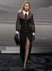滑走路の女性セクシーな長袖ボタン黒い足首の長さの包帯ドレスニットエレガントなイブニングセレブパーティー240410