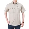 Chemises décontractées pour hommes Cargo Summer Summer Sleeve Blouse Combat Tactical Shirt Multi-Pocket Tenues Vêtements surdimensionnés 5xl