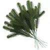 Dekorative Blumen 24PCs Gefälschte grüne Pflanzen Kiefernnadeln Realistisch suchen Weihnachtsthema Party Dekor