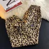 Calça masculina estampa de leopardo veludo homem roupas homens roupas japonesas moda vintage de alta qualidade de luxo calça calças de moletom 2024