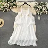 Casual klänningar Foamlina Beach Vacation Dress for Women Fashion Spring French Bubble Sleeves Hollowed Out Backless White