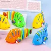 Sand Play Water Fun Fun Cartune Style Swing Pesce Toy Orologio Classico giocattolo appena nato giocattolo per bambini GIOCHI INTERACTIVE Y240416