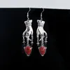 Boucles d'oreilles en peluche saignant rose avec sang rouge sorcellerie vampire fantôme bijoux de la mode