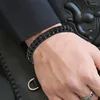 Pulseiras de charme 2024 pulseira retro de couro preto tecido de 8 mm de aço inoxidável nunca desapareceu do presente de joias masculinas e femininas boho