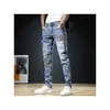 Jeans masculin 2023 hommes élégants pantalons déchirés minces liés de jean effilochés de jean mode pantalons skinny pantalones hombre 240122 drop de dh7iw