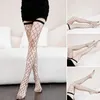 Sexiga strumpor Svart sexiga kvinnor fisknätstrumpor Tights Crystal Rhinestone Lady Nylon Stockings glänsande strumpbyxor över knästrumpor lår sock 240416