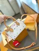 Ny designerväska kvinnors axelväska lyxvaror ryggsäck färgglada tryck design makeup väskor mini retro mjuk messenger plånbok