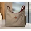 Folga de bolsas de varejo por atacado de 95% da versão feminina de alta qualidade em bolsas literárias nylon luxury crossbody student canvas garotas bag faculdade de faculdade para mensageiro