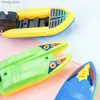 Zand speel water leuke kinderfilmenten drijvende speedboot klassiek mechanisch speelgoed bad douchebadbadbad 1 stuk y240416